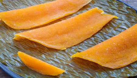 dried mango sheet texture background thai sweet dessertの素材