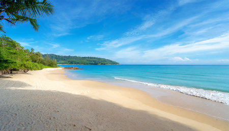 beautiful sandy beach and sea with clear blue sky background amazing beach blue sky sand sun daylight relaxation landscape view in phuket island thailand for summer and travel backgroundの素材