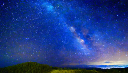 stars on background of the night starry sky milky way galaxies and universes on a dark blue backgroundの素材