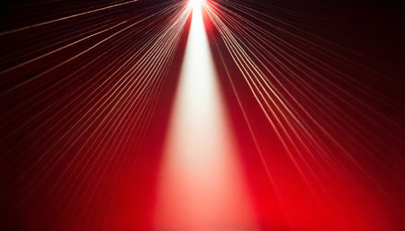 white ray of light on a red background to the point turning into blackoutの素材