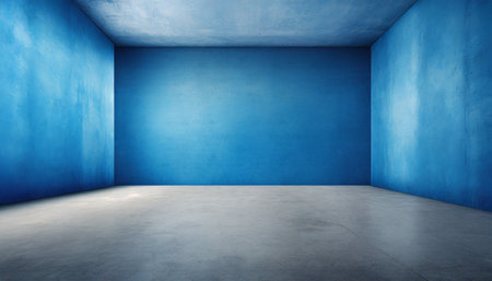 blue wall in an empty room with concrete floorの素材