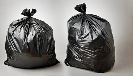 black garbage bag on or white backgroundの素材