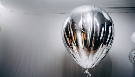 big helium inflatable latex clear silver balloon for decorations on birthday wedding corporative party on whiteの素材