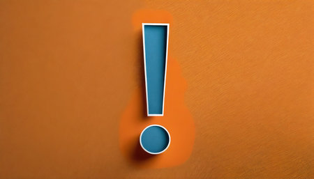 paper cut out exclamation mark over orange background idea solution or communication business concept background with copy spaceの素材