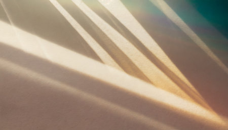 sunlight background abstract backdrop with light and shadow glare and shine on paper texture rainbow flare beige color trend aesthetic wallpaper natural beams light caustics effectの素材