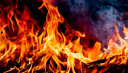 the flame of fire burning red hot blur imageの素材