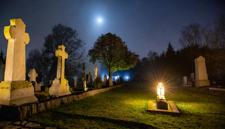 night scene in a cemetery with gravestonesの素材