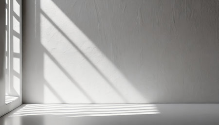 minimalist light background with shadow on a white wallの素材
