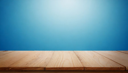 wood table top on gradient light blue backgroundの素材