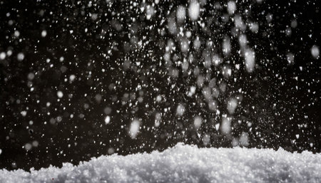 falling snow down on the black backgroundの素材