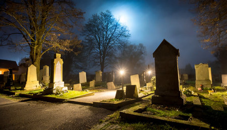night scene in a cemetery with gravestonesの素材