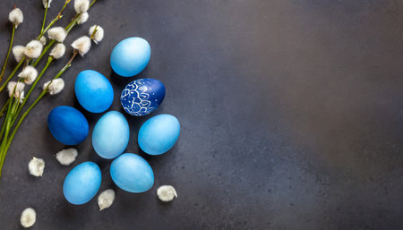 blue easter eggs painted by hand on a dark background easter stylish minimal composition top view flat lay copy spaceの素材