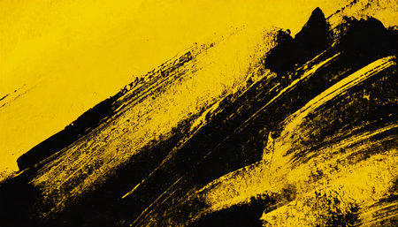 yellow and black paint background texture with brush strokesの素材
