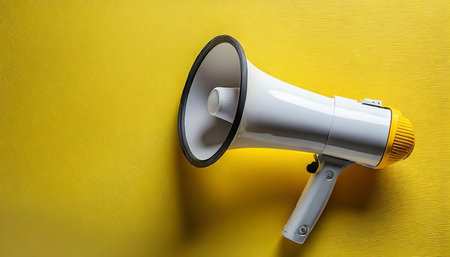 megaphone on yellow backgroundの素材