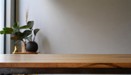 close up image of mockup space on a minimal wooden tabletop in a minimalist roomの素材