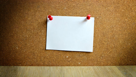 blank sheet of paper on bulletin boardの素材