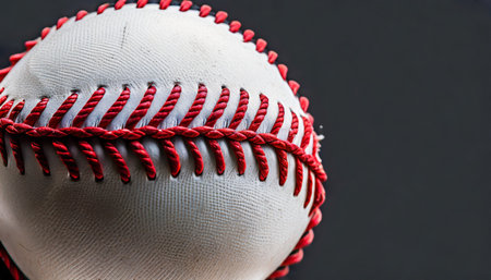 red stitches on a baseball negative space in imageの素材