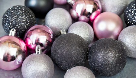 background of pink black and silver matte christmas ballsの素材