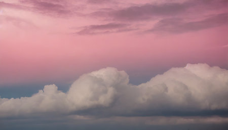 some clouds are over a pink skyの素材