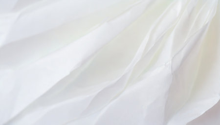pronounced creases on white paper abstract backgroundの素材