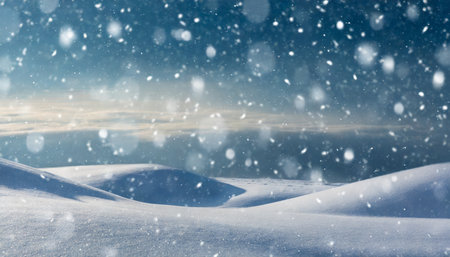 beautiful ultrawide background image of light snowfall falling over of snowdriftsの素材