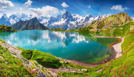 colorful summer panorama of the lac blanc lake with mont blanc monte bianco on backgroundの素材