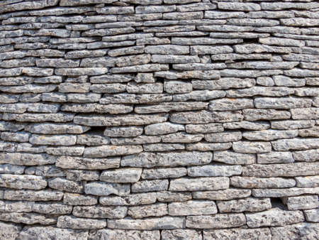 wall of stone built without soldering materialsの写真素材
