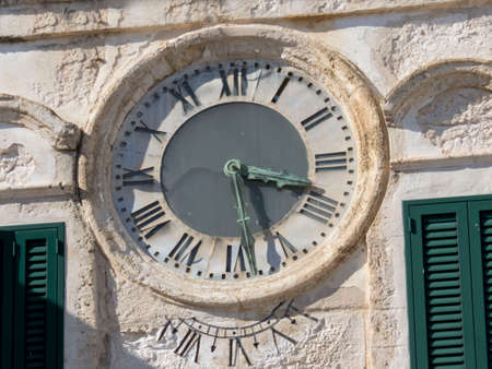 beautiful old town clock on clock towerの写真素材