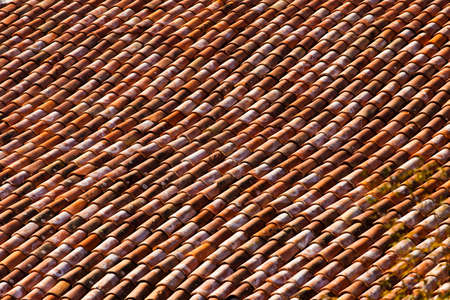 beautiful old tiled roof of houseの写真素材