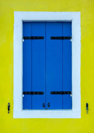 srasiv colorful window of an old houseの写真素材