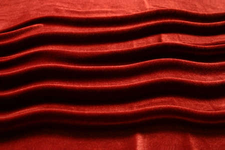 beautiful red drapery of satin on the tableの写真素材
