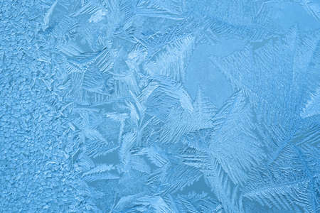 Beautiful frost pattern on a window.の写真素材