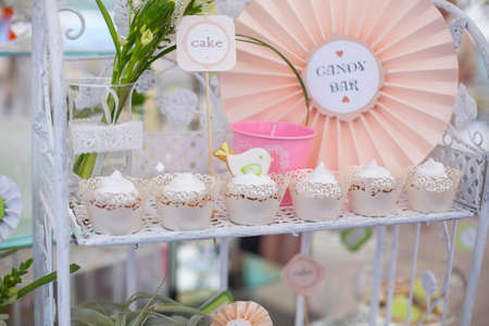 Birthday party table setting with food and Cakeの写真素材