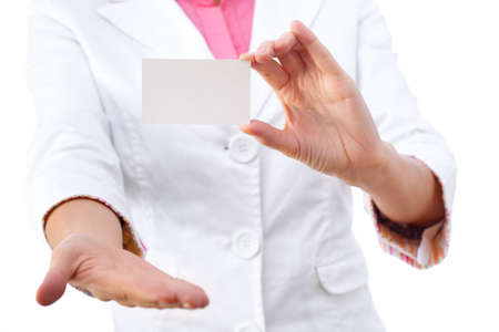 Business card closeup - businesswoman in white suit holding blank empty sign.の写真素材