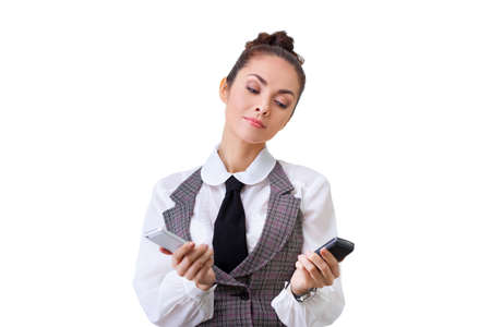 Businesswoman thinking about which mobile phone is better