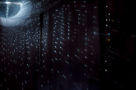 Shiny disco ball on nightclub good for backgroundの写真素材