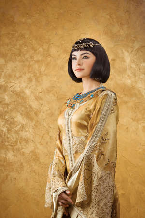 Fashion Stylish Beauty Portrait with Black Short Haircut and Professional Make-Up of Cleopatra. Beautiful Girl's Face Close-up.の写真素材