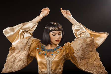 Fashion Stylish Beauty Portrait with Black Short Haircut and Professional Make-Up of Cleopatra....