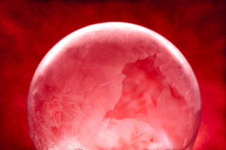 Frozen snow globe christmas magic ball with flying snowflakes. Winter Background. For Christmas and...