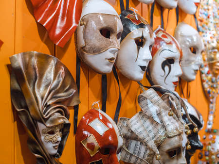 Venetian masks in store display in Venice. Annual carnival in Venice is among the most famous in Europe. Its symbol is the Venetian maskの写真素材