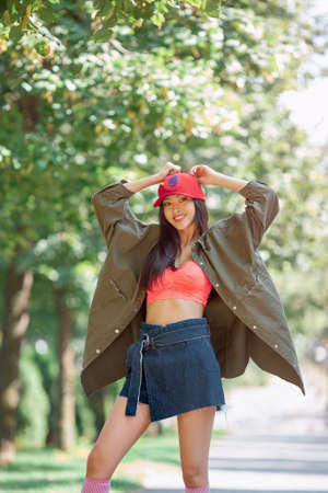 Asian woman urban fashion photo. Beautiful mixed race asian caucasian young girl in unique hand made...