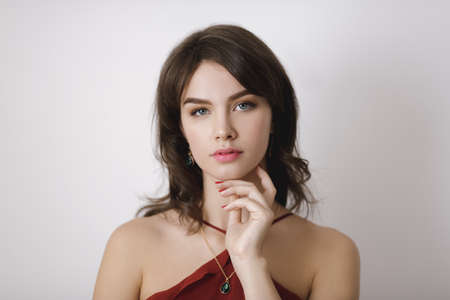 Beauty portrait of female face with natural perfect skin. Studio portrait of a beautiful young woman...