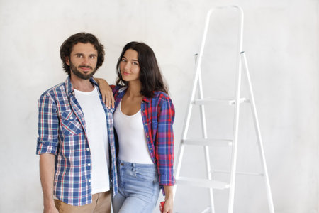 Happy Couple Ready for DIY Home Renovation Projectの写真素材