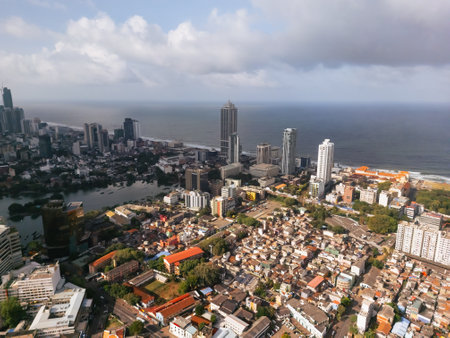 Aerial View Of Colombo Cityscape With Oceanfront Skyscrapers And Homesの写真素材