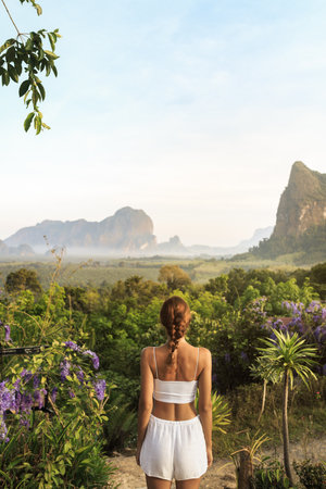 Redhead Woman Enjoying Scenic Jungle View At Sunrise In Krabi, Thailand