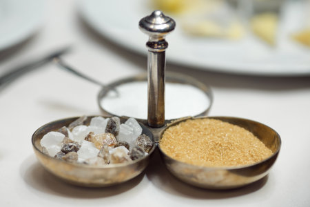 Close-Up Of Assorted Sugars In Elegant Silver Serving Dishesの写真素材