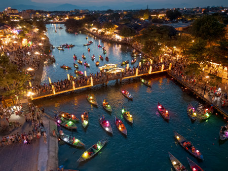 Crowded Lantern Festival Bridge In Hoi An Over Glowing Night Riverの写真素材