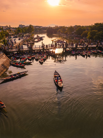 Tourist Boats On River In Hoi An Vietnam At Sunset Timeの写真素材