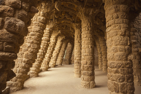 Rustic Stone Archway and Leaning Columns in Park Guell, Barcelona, Spain