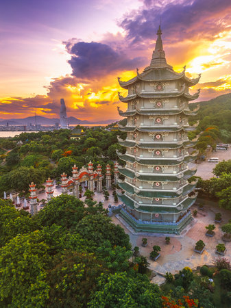 Sunset Over Linh Ung Pagoda Tower With Scenic Coastal View In Da Nang Vietnamの写真素材
